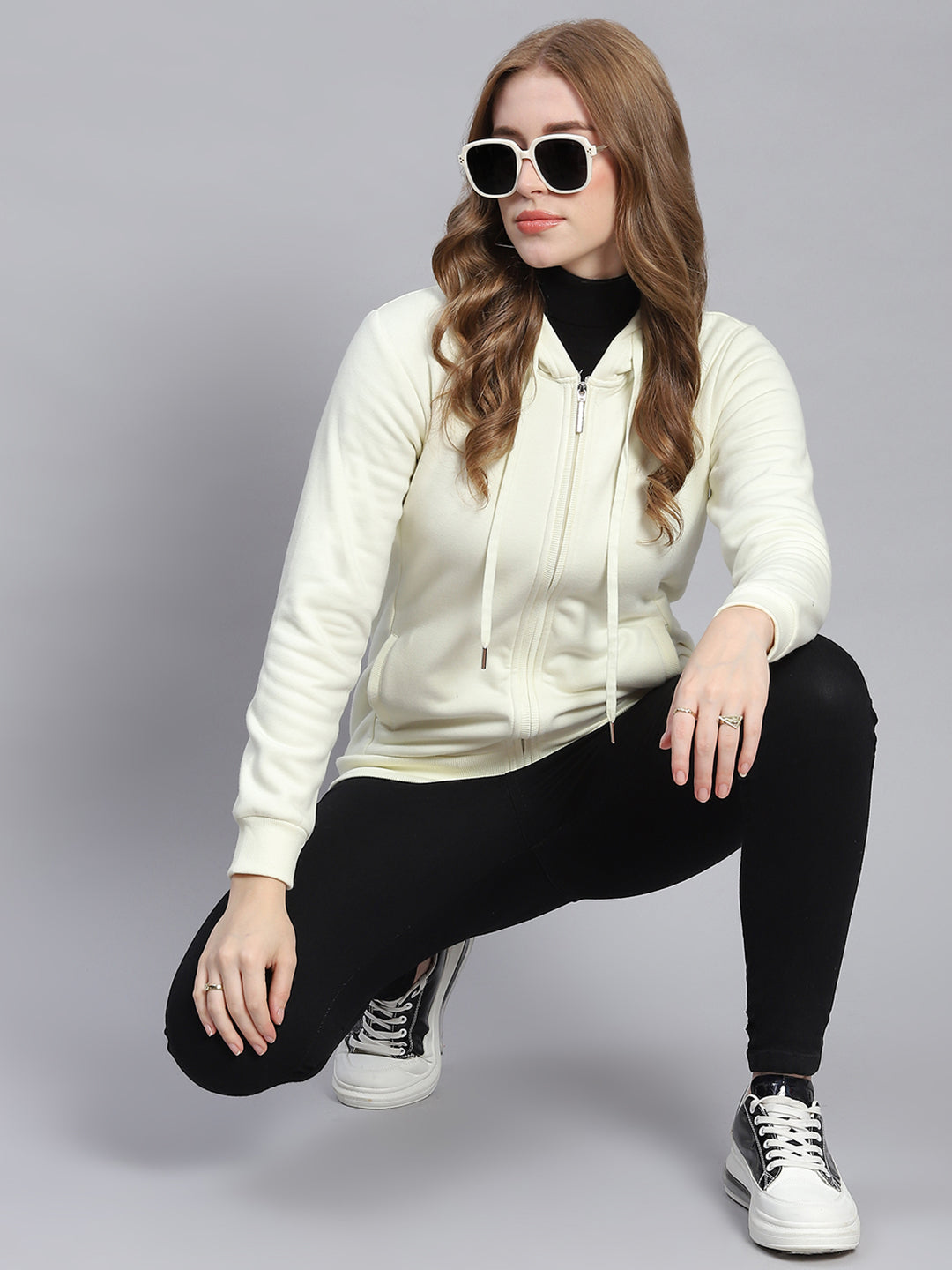 Women Cream Solid Hooded Full Sleeve Sweatshirts