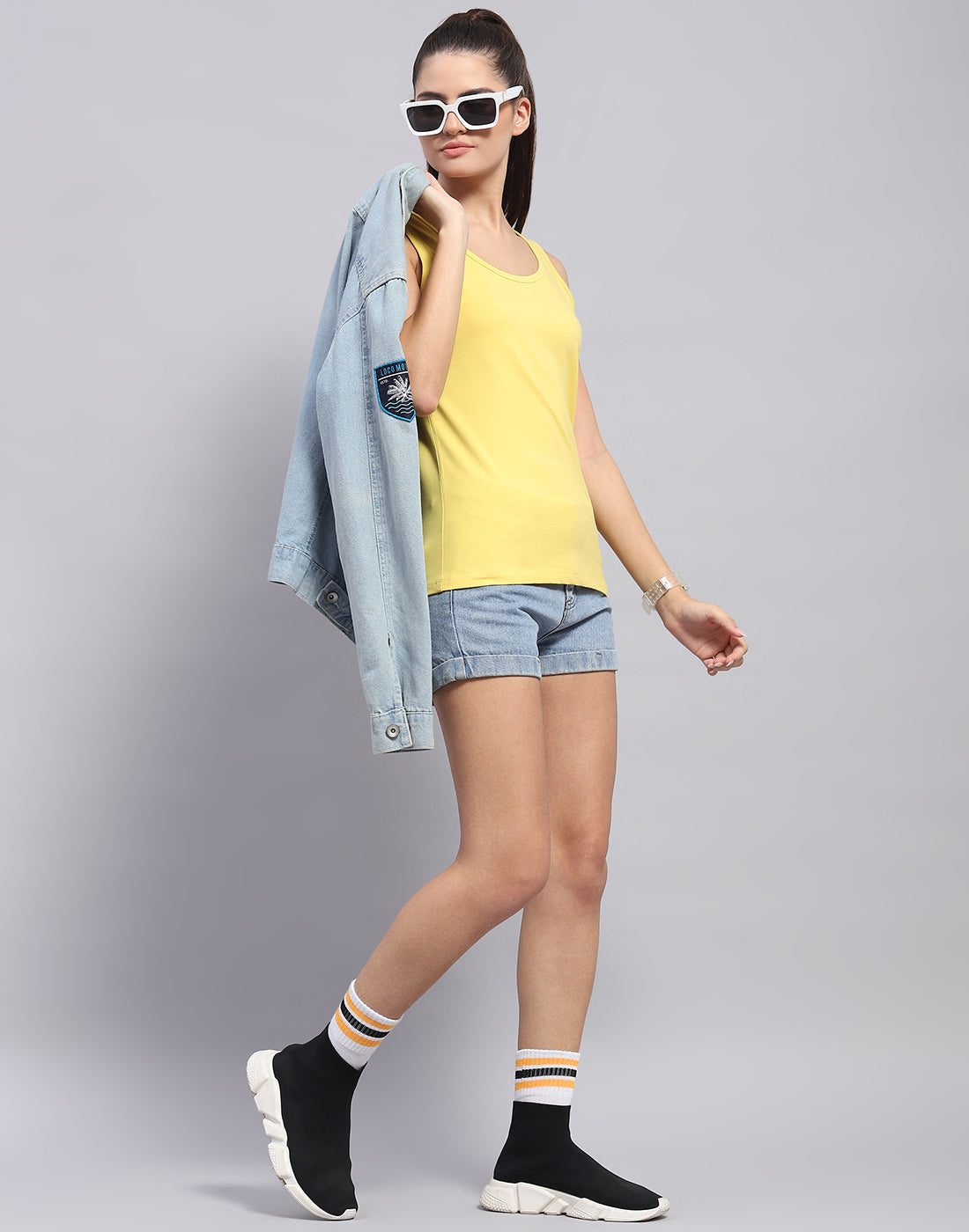 Women Yellow Solid Round Neck Sleeveless Top