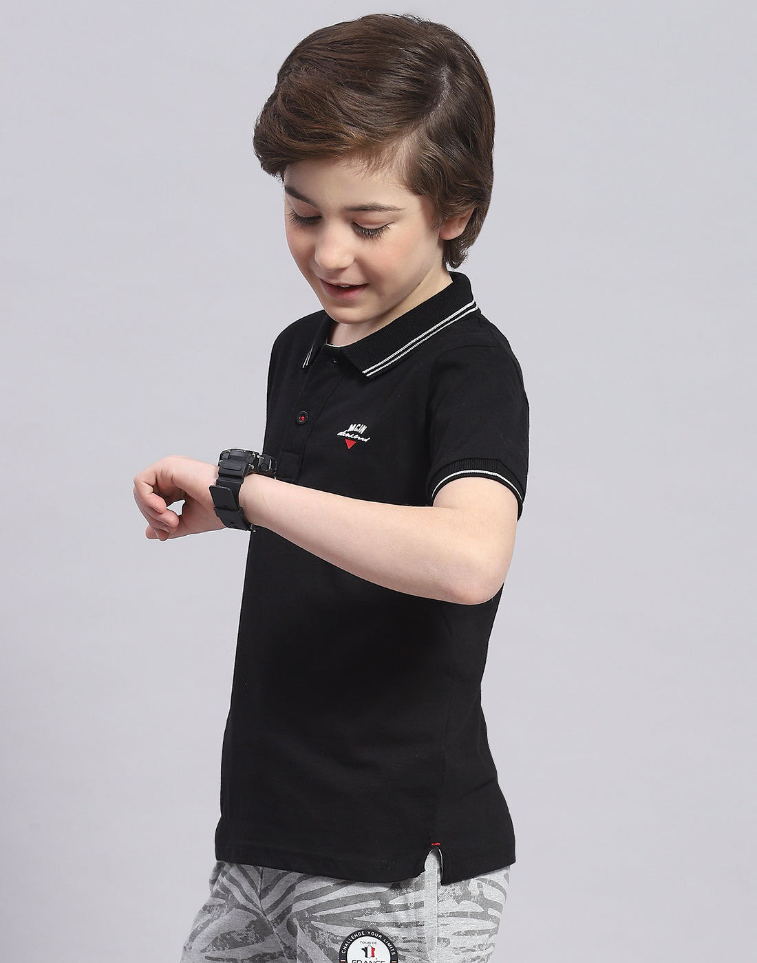 Boys Black Solid Polo Collar Half Sleeve T-Shirt