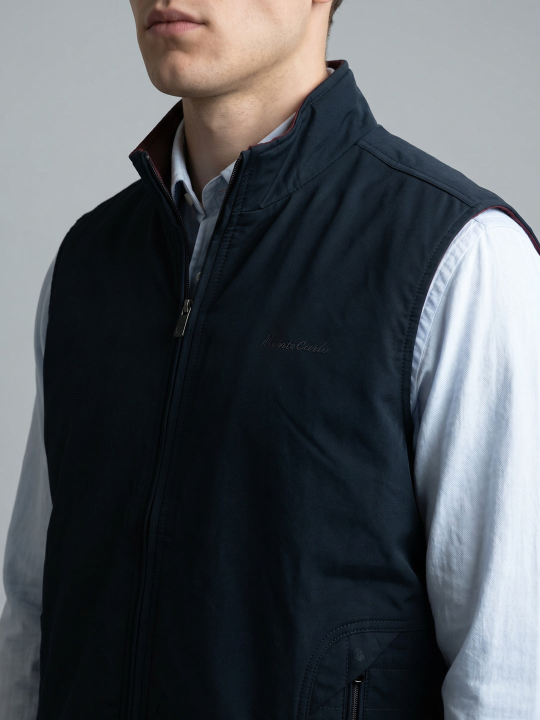 Men Navy Blue Solid Stand Collar Sleeveless Reversible Jacket
