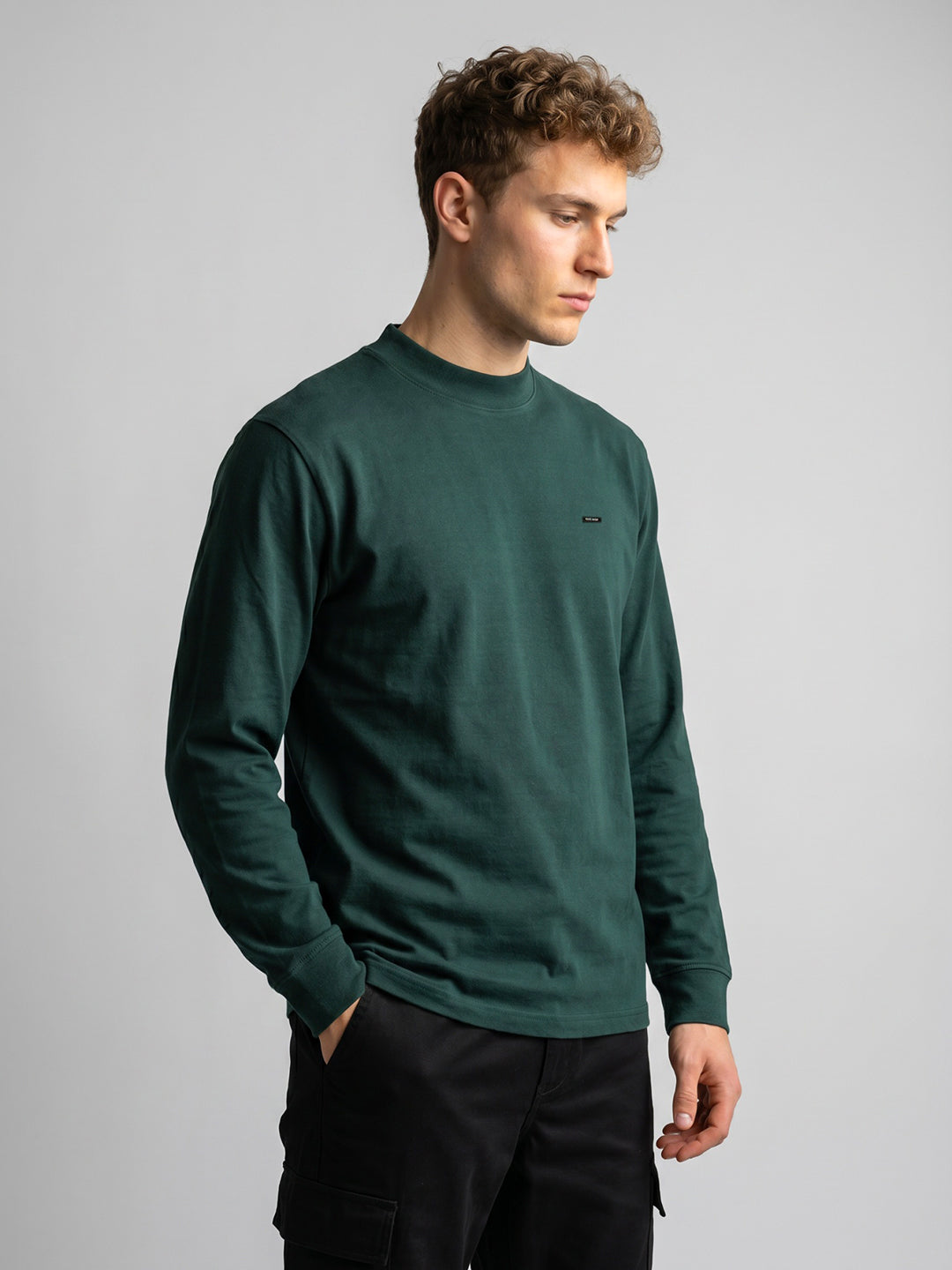 Men Green Solid Round Neck Full Sleeve Sweatshirt