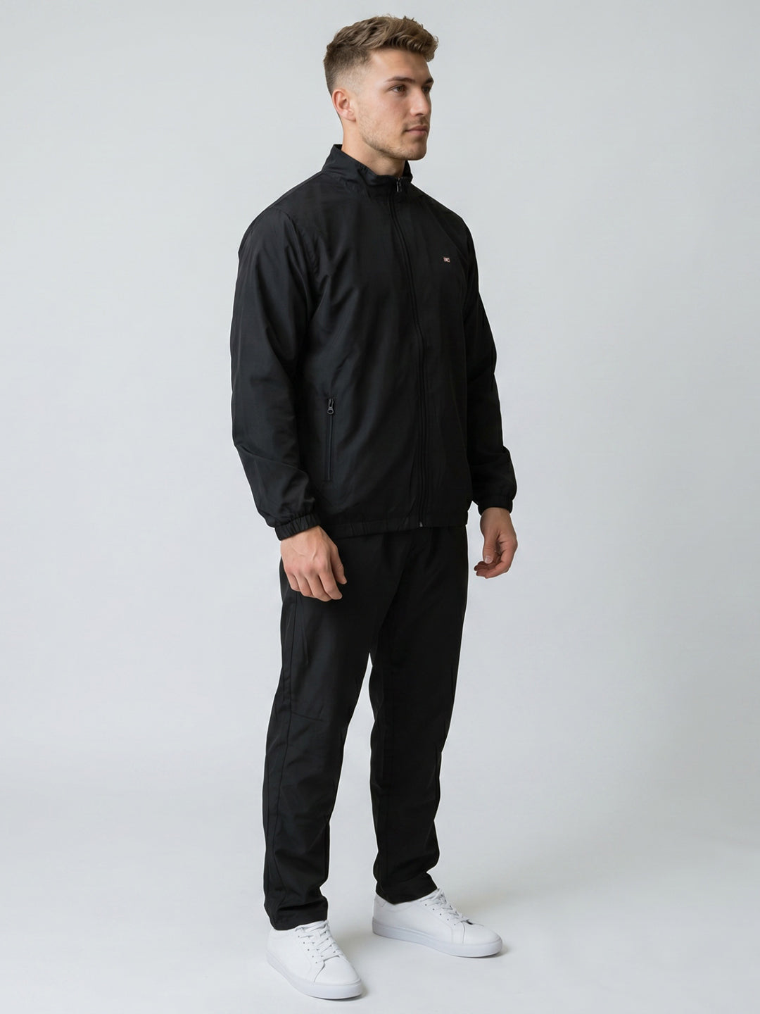 Men Black Solid Stand Collar Full Sleeve Tracksuit