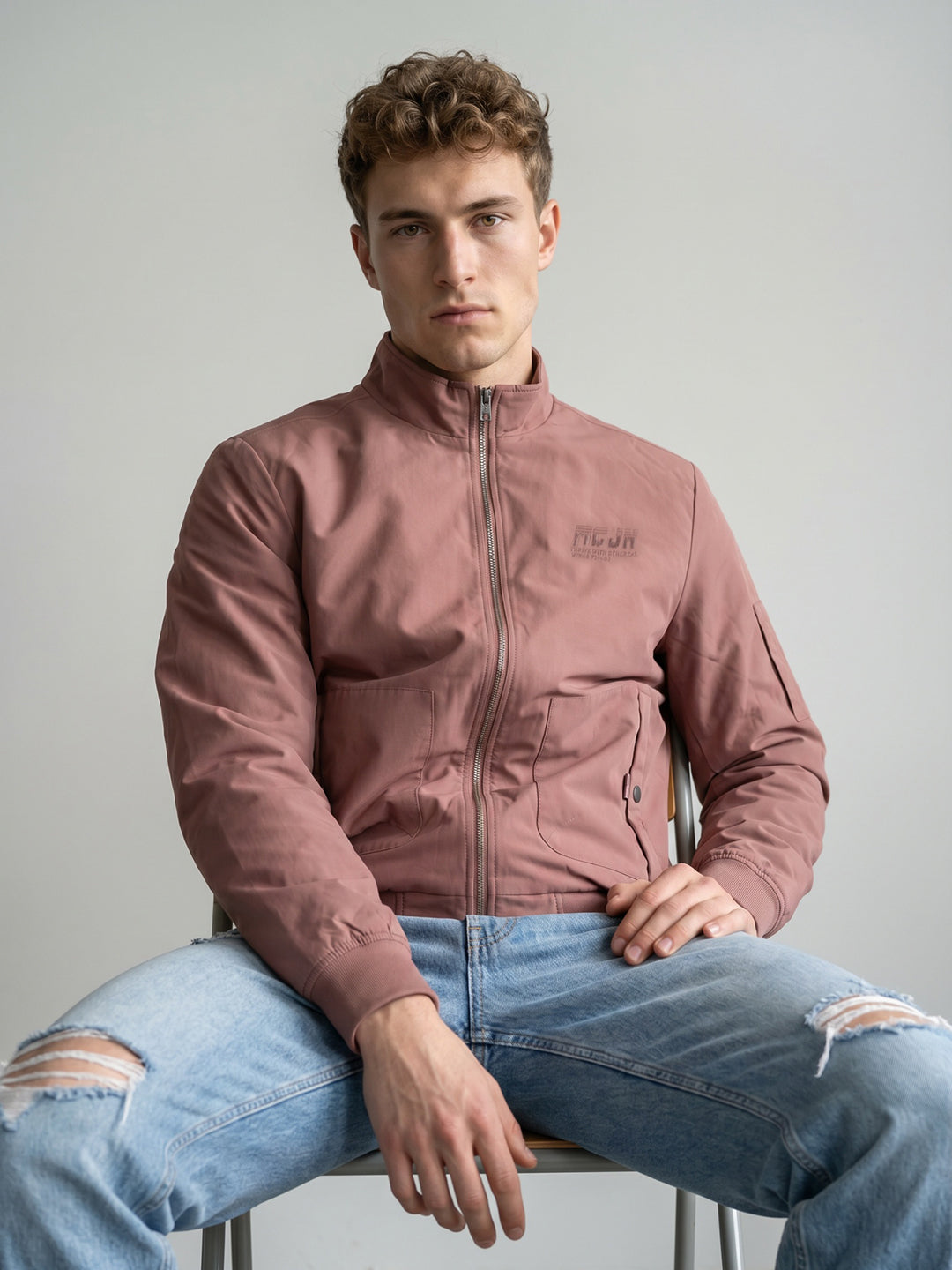 Men Peach Solid Stand Collar Full Sleeve Bomber Jacket
