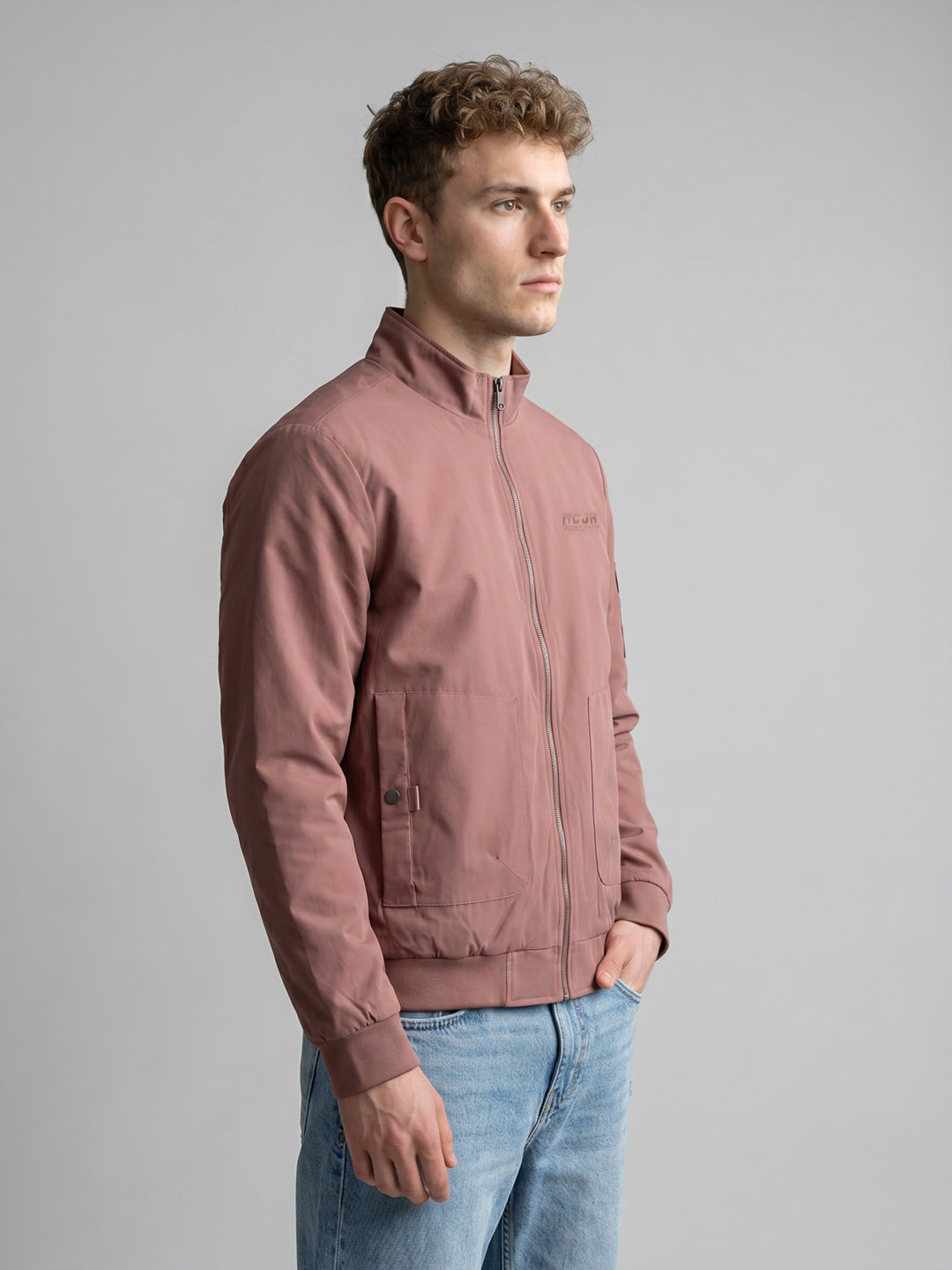Men Peach Solid Stand Collar Full Sleeve Bomber Jacket