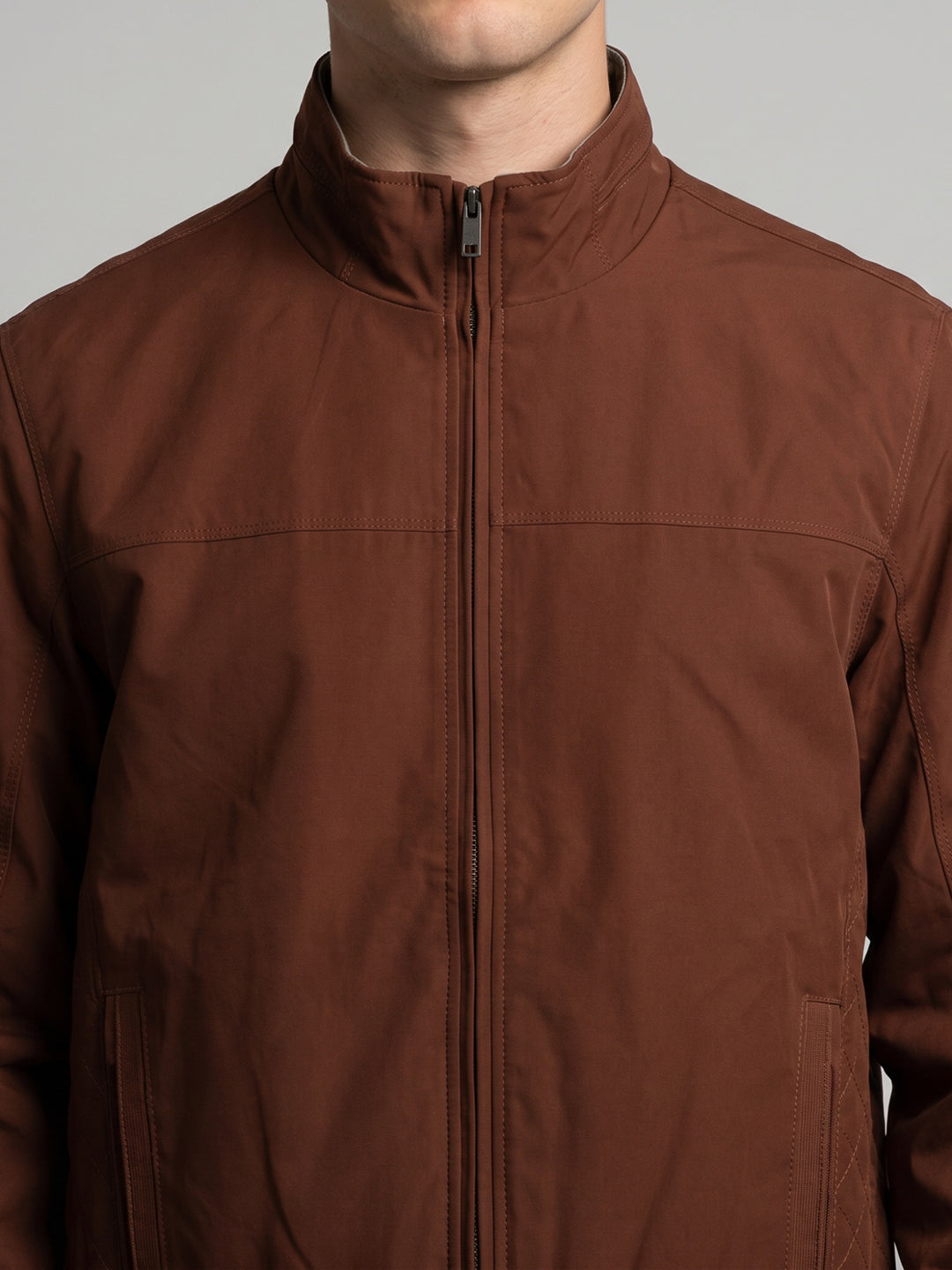 Men Rust Solid Stand Collar Full Sleeve Reversible Bomber Jacket