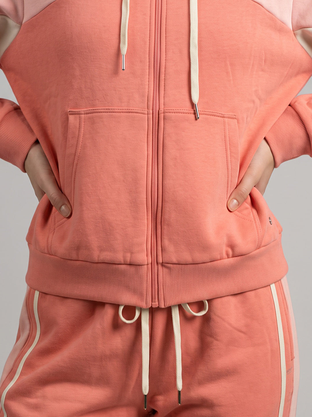 Women Coral Solid Hooded Full Sleeve Tracksuit