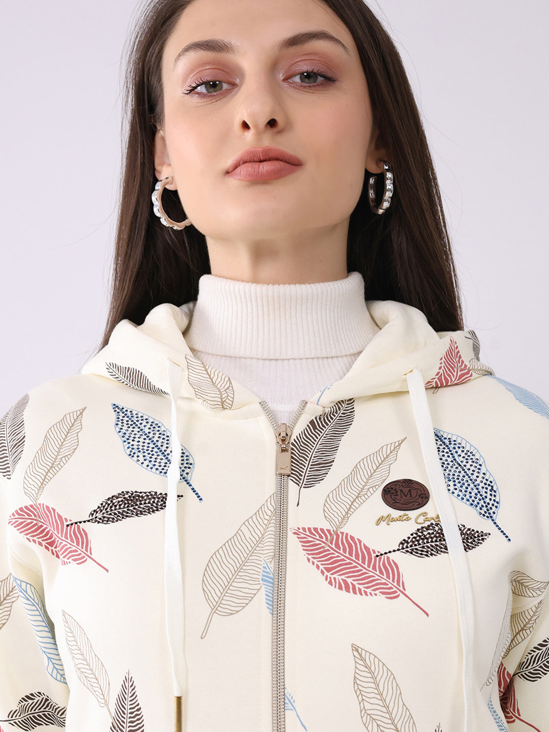 Women Cream Printed Hooded Full Sleeve Sweatshirt