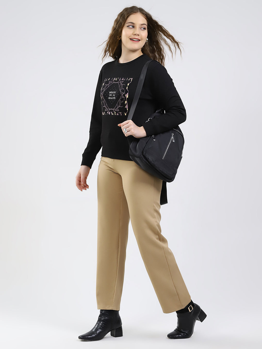 Women Black Printed Round Neck Full Sleeve Winter Top