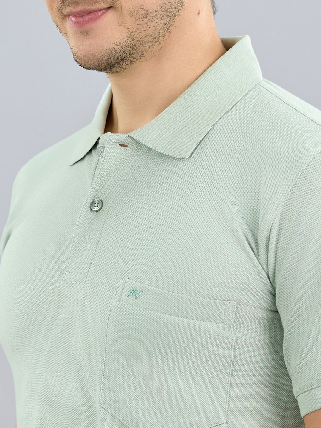 Men Green Solid Polo Collar Half Sleeve T-Shirt