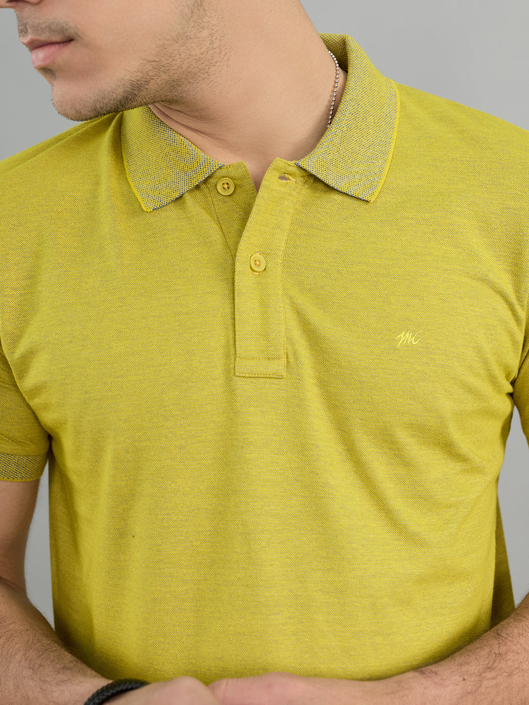 Men Yellow Solid Polo Collar Half Sleeve T-Shirt