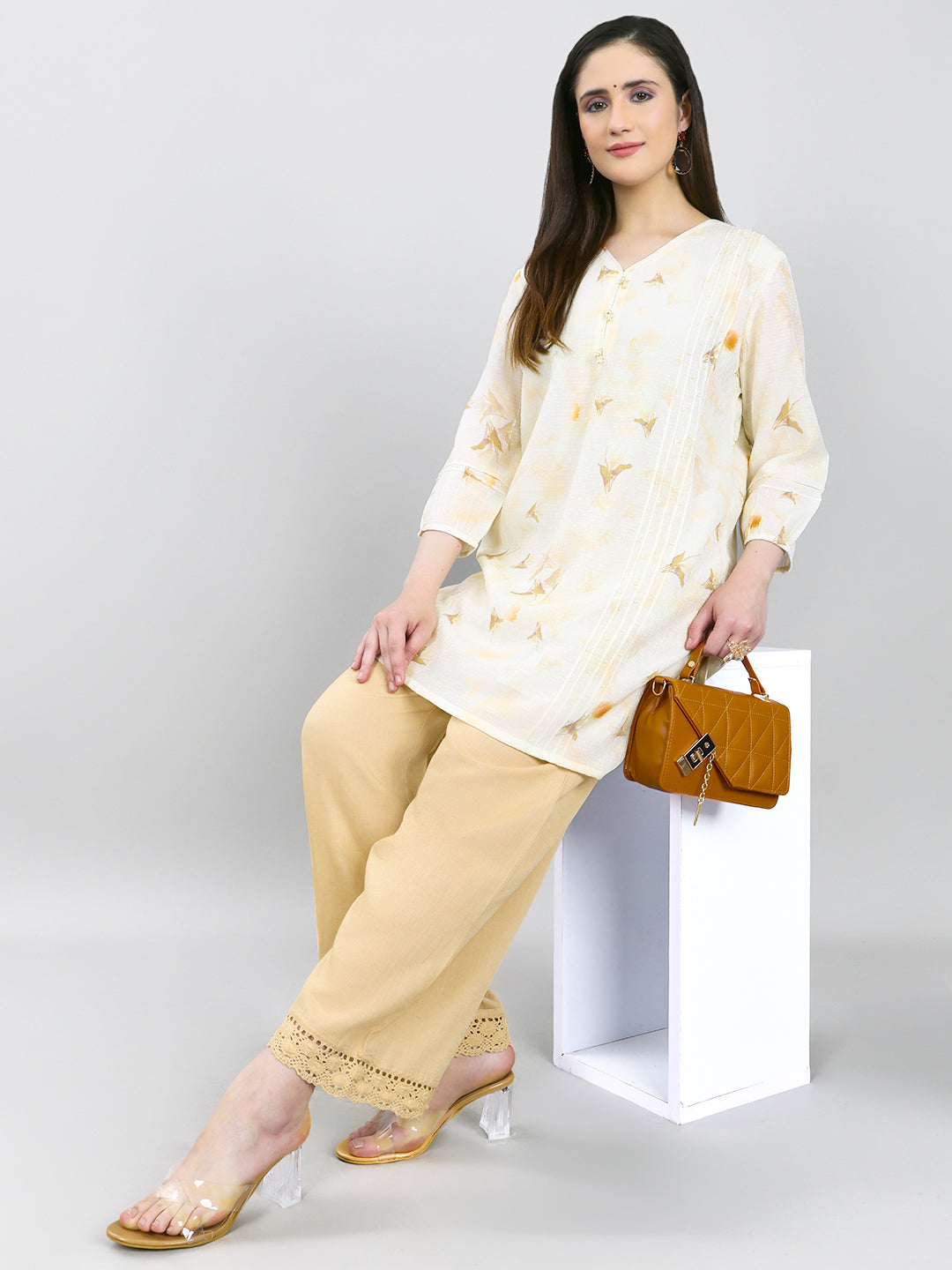 Women Cream Printed V Neck Kurti
