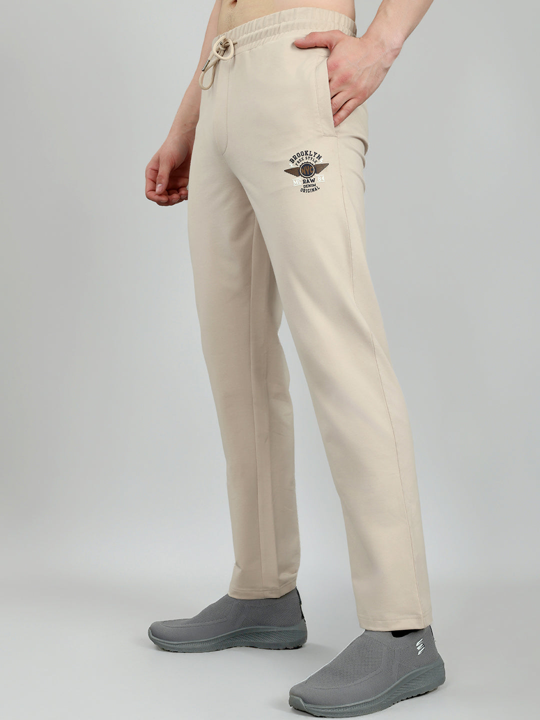 Men Beige Solid Regular Fit Lower