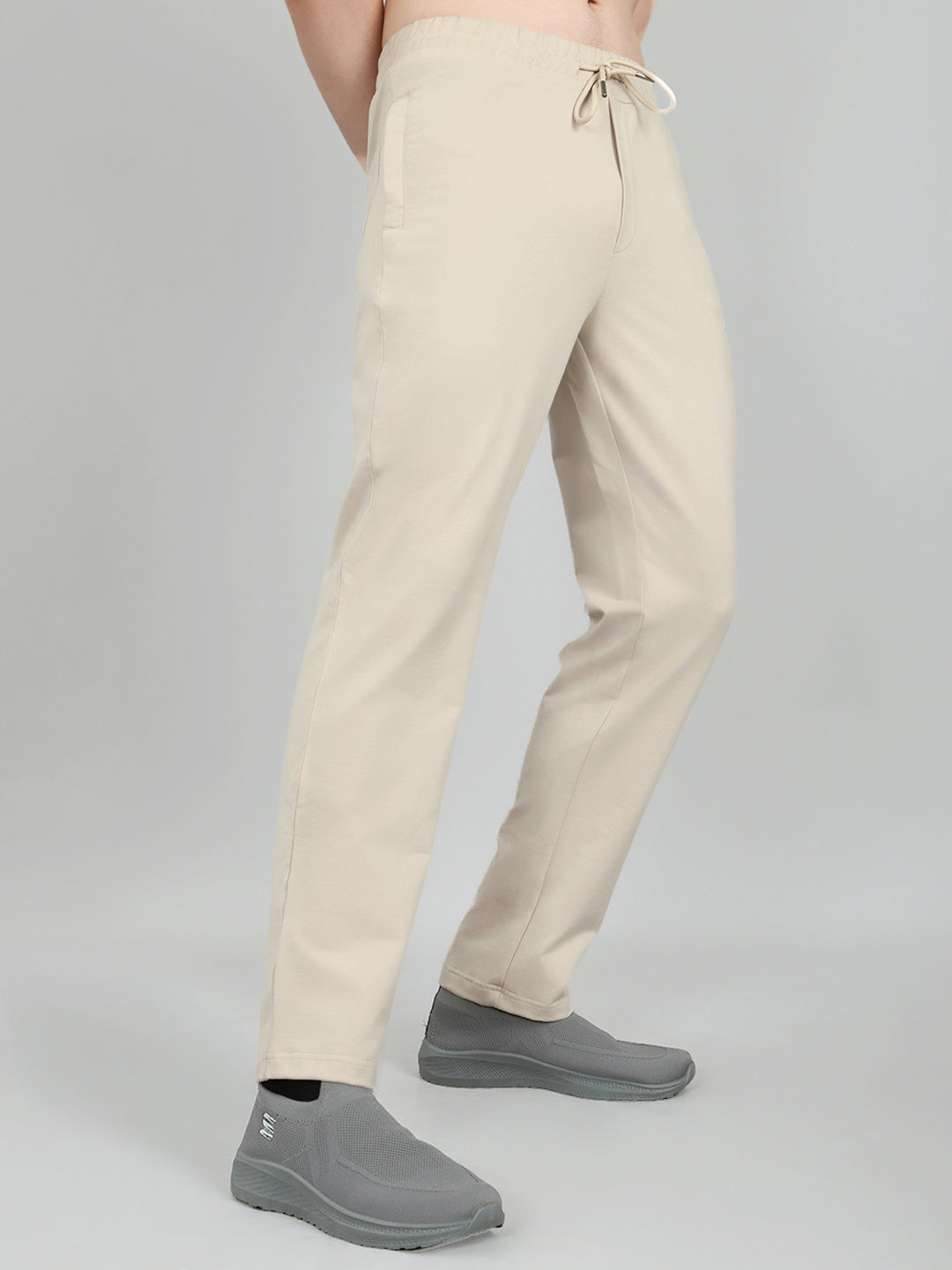 Men Beige Solid Regular Fit Lower