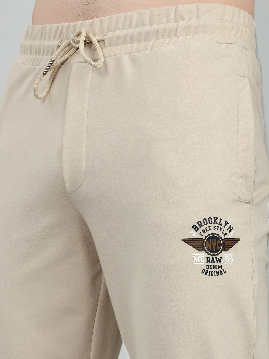 Men Beige Solid Regular Fit Lower