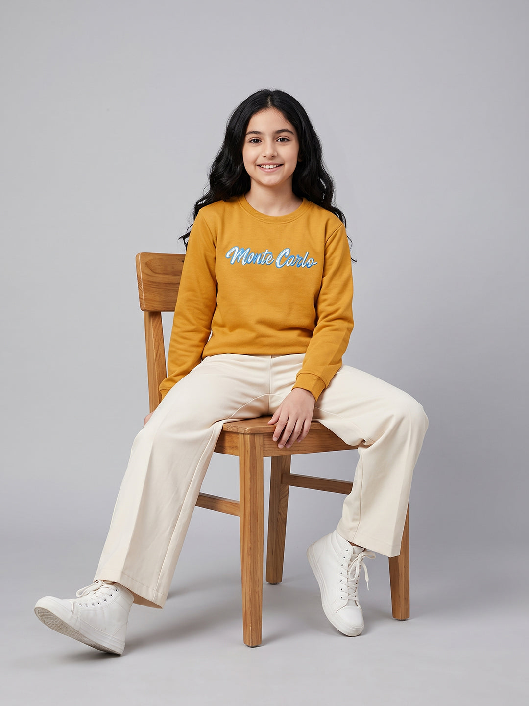Girls Orange Printed Round Neck Full Sleeve Sweatshirt