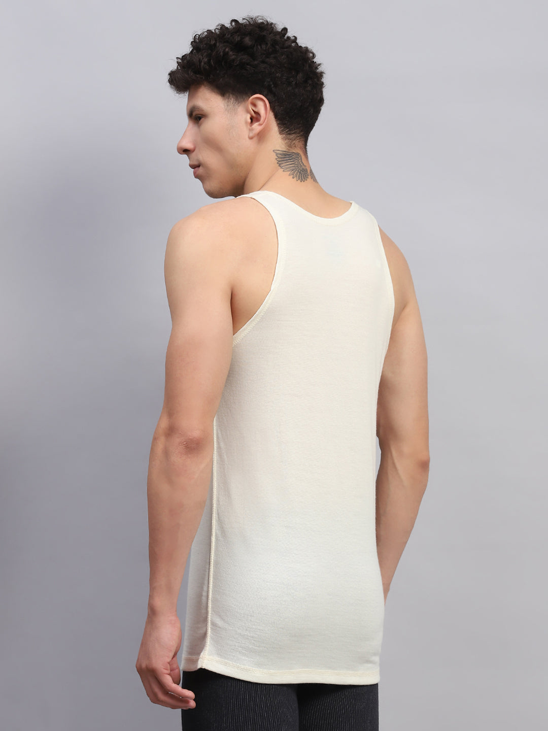 Men Cream Solid Round Neck Sleeveless Thermal Vest