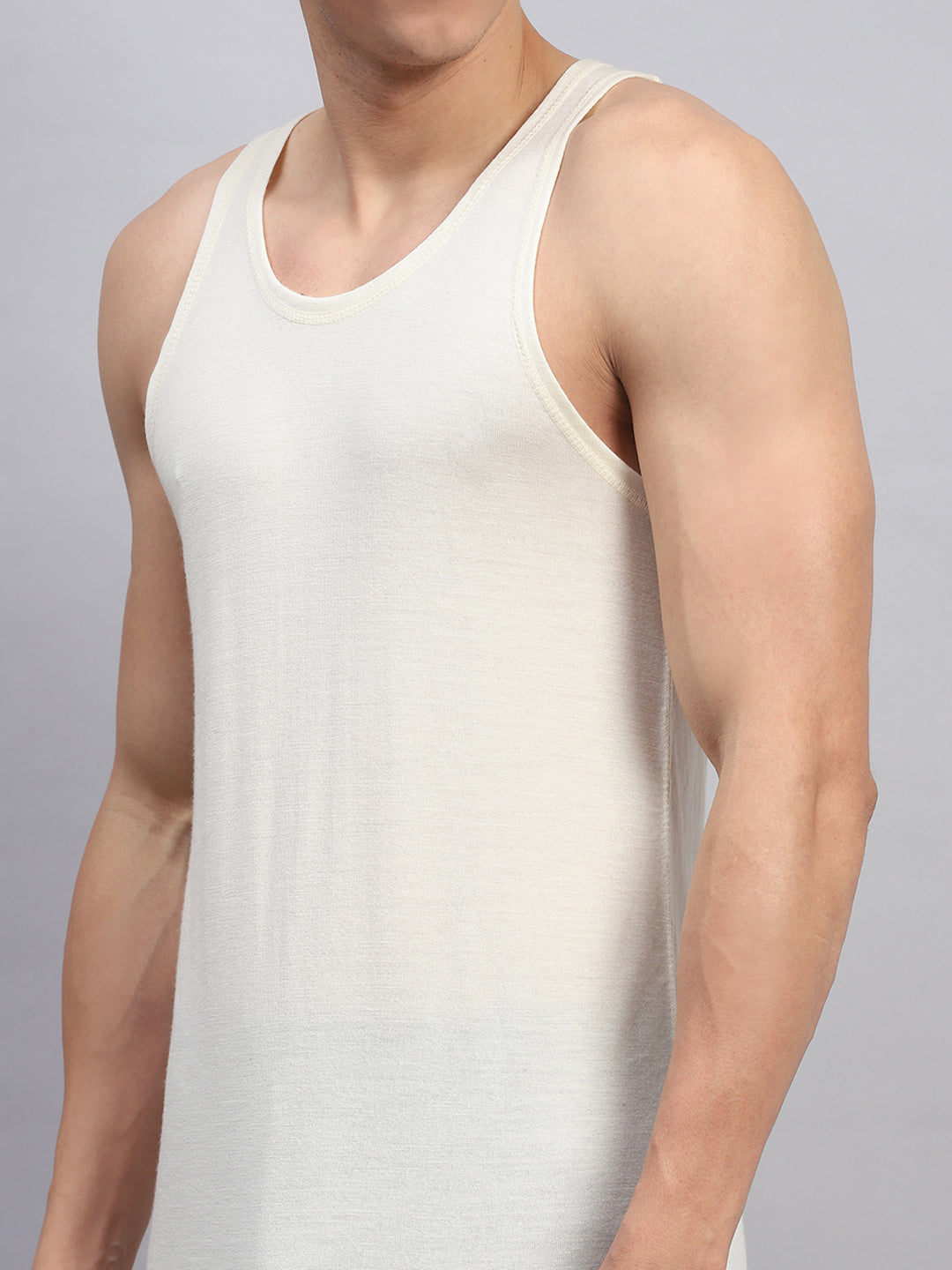 Men Cream Solid Round Neck Sleeveless Thermal Vest