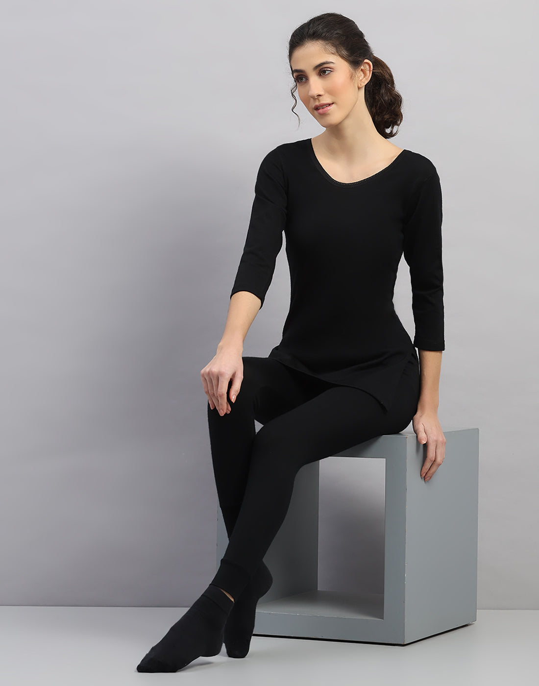 Women Black Solid Regular Fit Thermal Lower