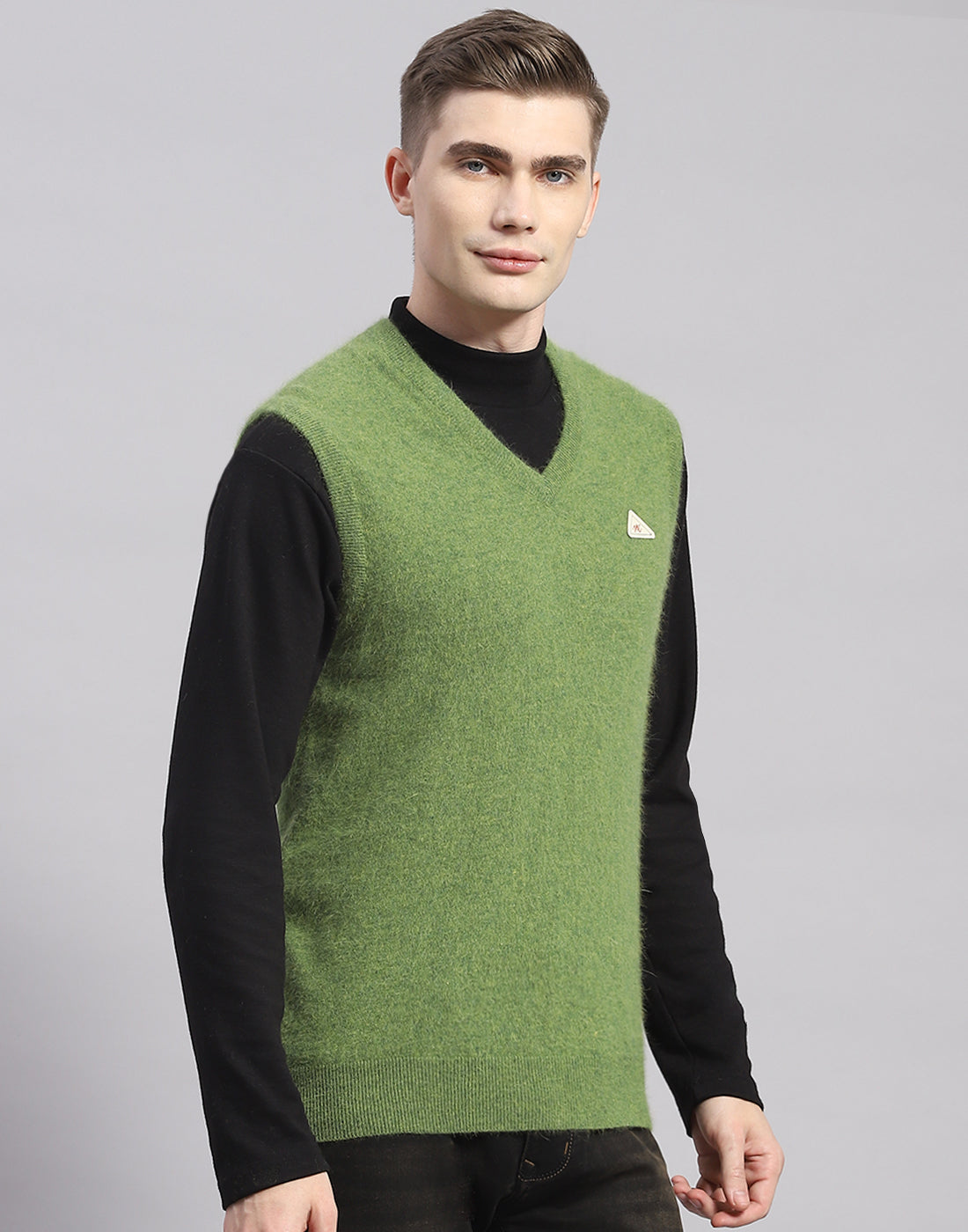 Men Green Solid V Neck Sleeveless Sweater