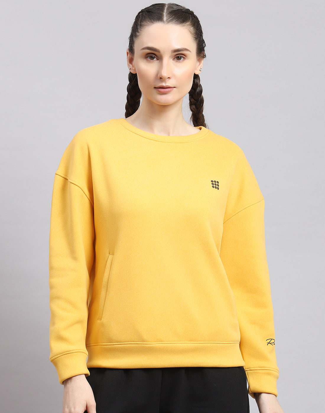 Women Yellow Solid Round Neck Full Sleeve Sweatshirt