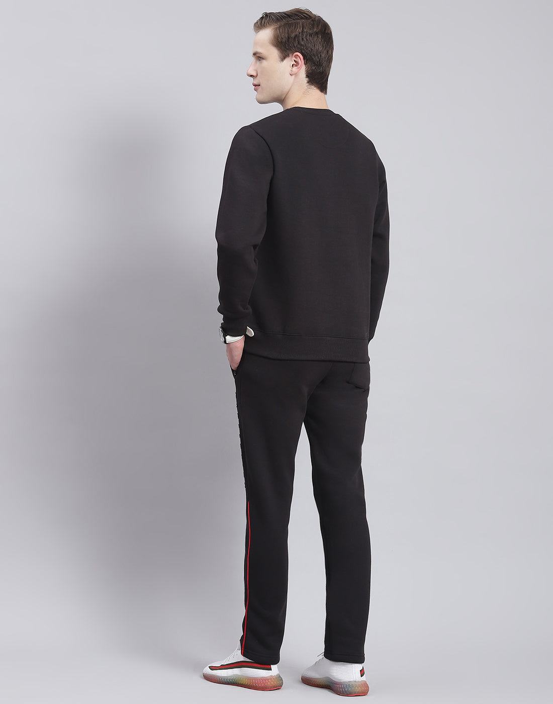 Buy Men Black Solid Round Neck Full Sleeve Tracksuit Online in