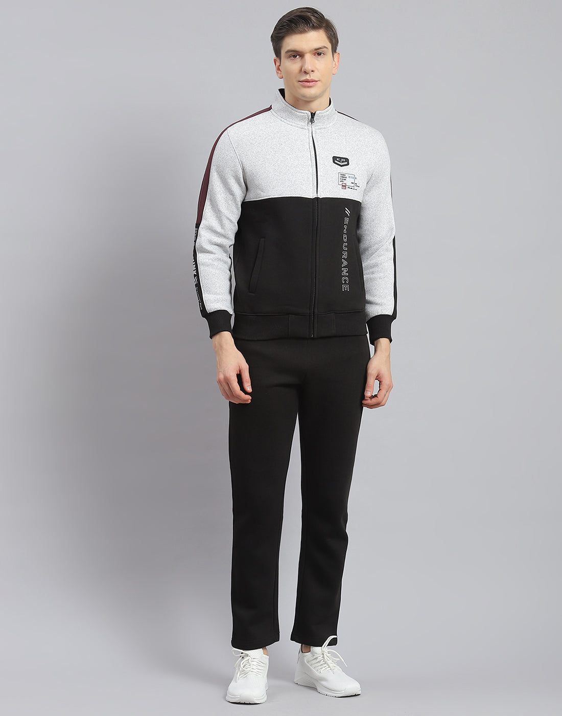 Men Black Solid Stand Collar Full Sleeve Tracksuit