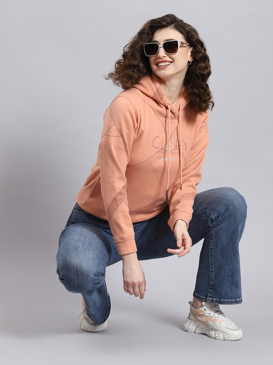 Women Peach Printed Hooded Full Sleeve Sweatshirt